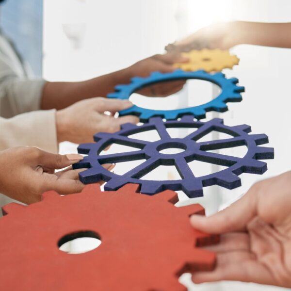 business-people-toys-and-gears-at-job-for-teamwor-2026-03-25-02-43-43-utc